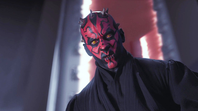 Darth Maul staring downward at Obi-Wan Kenobi in Star Wars: The Phantom Menace