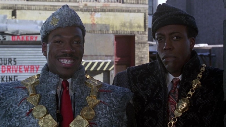 Akeem and Semmi in fancy clothes in Coming to America