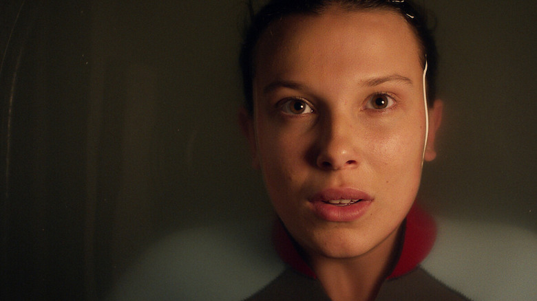 Mel Bobby Brown in eleven submerged in a basin in strange things
