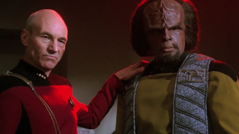 Picard putting his hand on Worf in Star Trek: The Next Generation