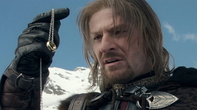 Boromir holding the Ring of Power in The Lord of the Rings: The Fellowship of the Ring