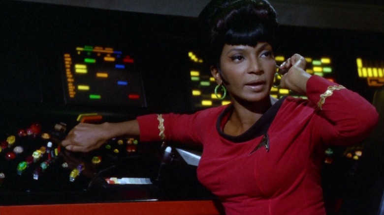 Uhura at the communications station on Star Trek