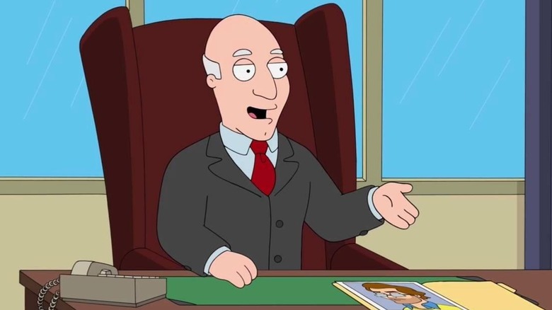 Avery Bullock in his office chair in American Dad
