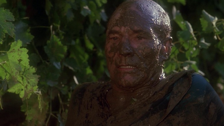 Captain Picard covered in mud on Star Trek: The Next Generation