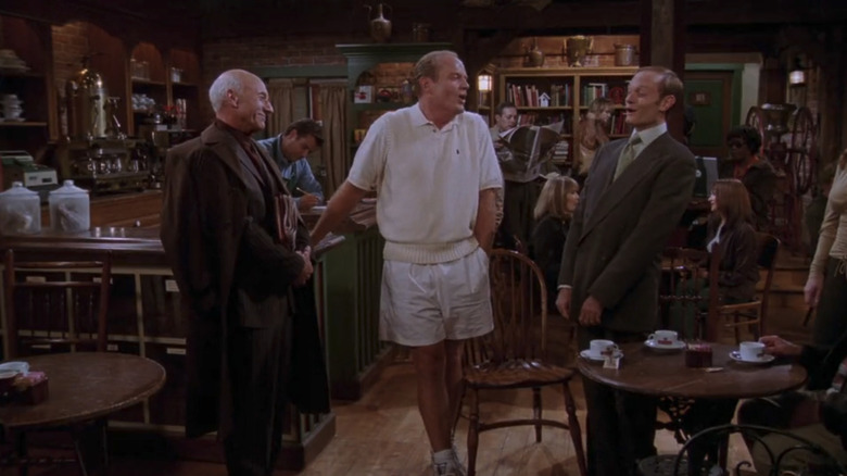 Patrick Stewart's Alistair Burke stands with Kelsey Grammer's Frasier Crane and David Hyde Pierce's Niles Crane in Cafe Nervosa in Frasier