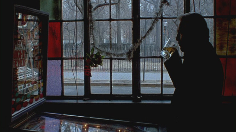 Paul Newman's Frank Galvin drinking and playing pinball in The Verdict