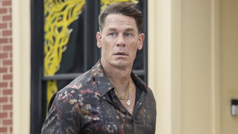 John Cena as Christopher Smith wearing a tacky shirt on Peacemaker