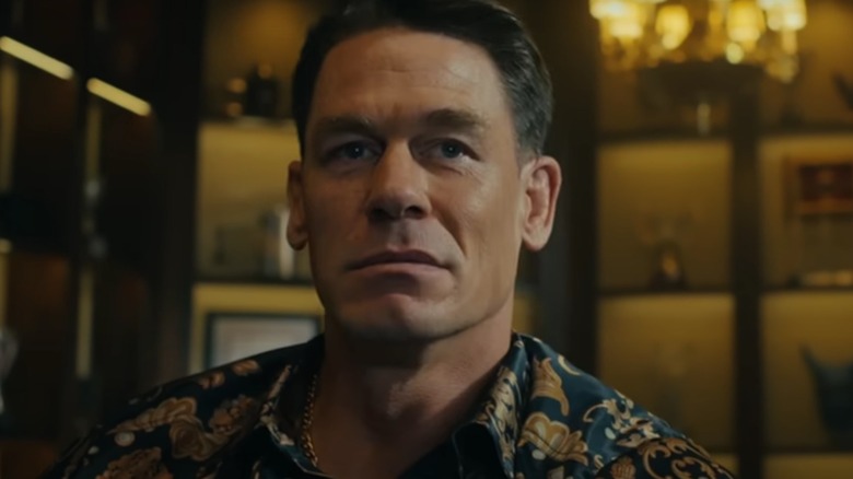 John Cena as Christopher Smith looking thoughtful on Peacemaker