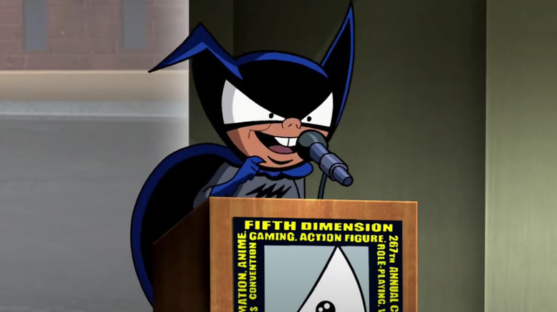 Paul Reubens as Bat-Mite on a podium on Batman: The Brave and the Bold