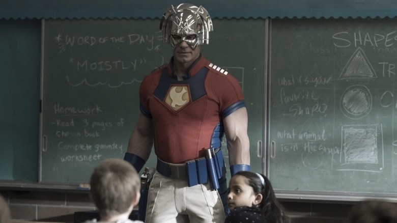 Peacemaker talking to a classroom full of kids