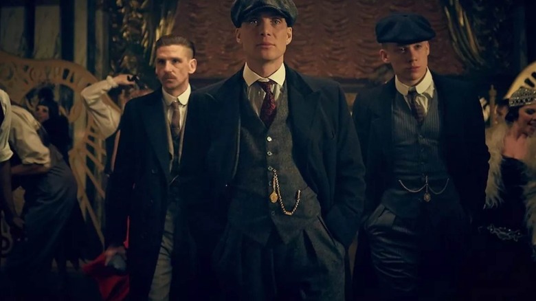 Arthur, Tommy and John Shelby walking together in Peaky Blinders