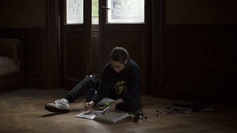 Kristen Stewart on the floor in Personal Shopper