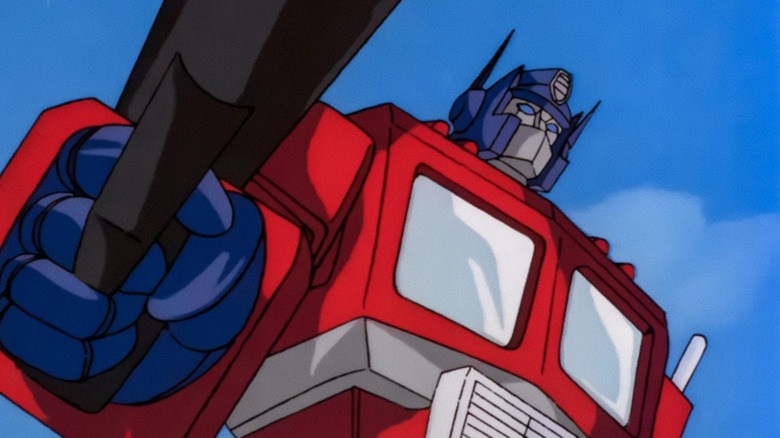 The Transformers (1984) - Optimus Prime holding his ion blaster