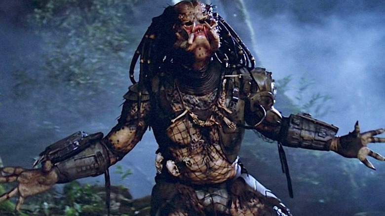 The Predator yelling with its arms out in Predator