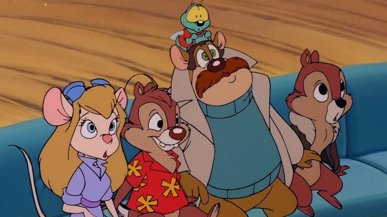 Gadget, Dale, Monterey Jack, and Chip sitting on the couch in Chip 'n Dale Rescue Rangers