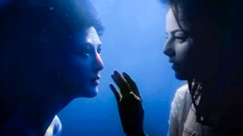 Marie about to touch mermaid