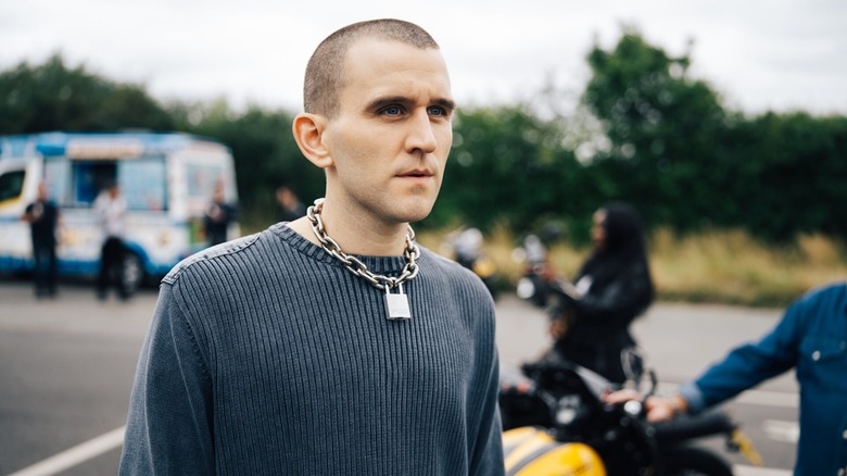 Harry Melling as Colin wearing his collar and looking for Ray in Pillion