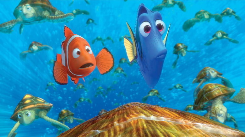 Marlin and Dory swimming with the sea turtles looking scared in Finding Nemo