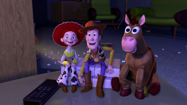 Jessie Woody and Bullseye looking at something in Toy Story 2