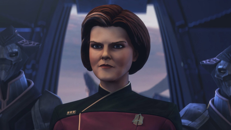 Kate Molgro, as the voice of Catherine Janouway, stands attention in the animation series Star Trek: Prodigy