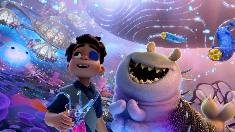 Elio and Glordon soar through the Communiverse alongside Ooooo