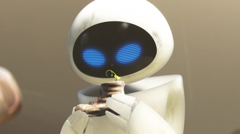 Eve holding a plant in a boot in WALL-E
