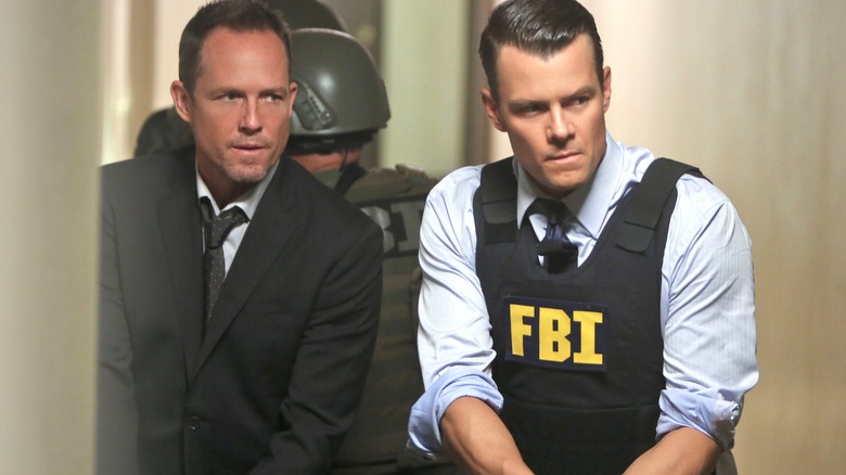 Agnew and Chamberlain enter a crime scene together in Battle Creek