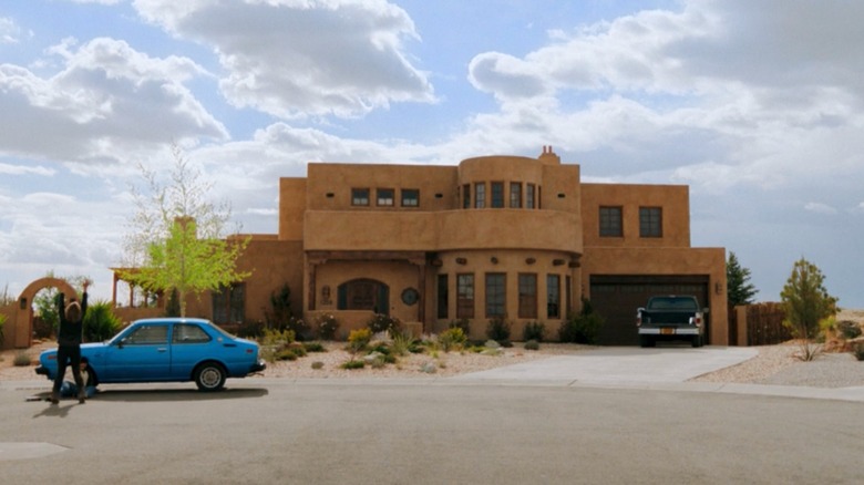 Pluribus - Carol Sturka screaming up to the sky in front of her house in ABQ