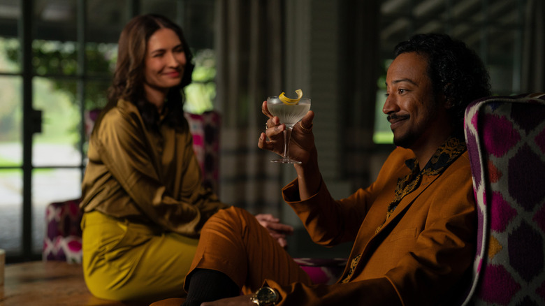 Karolina Wydra's Zosia and Samba Schutte's Koumba sitting and smiling on Pluribus