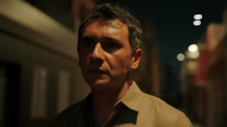 Carlos Manuel Vesga's Manousos looking scared on Pluribus