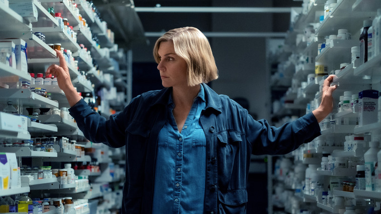 Rhea Seehorn's Carol Sturka in a medical storage room on Pluribus