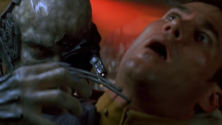 Star Trek: First Contact - Borg drone assimilating Starfleet crewman by launching nanotubes into his neck
