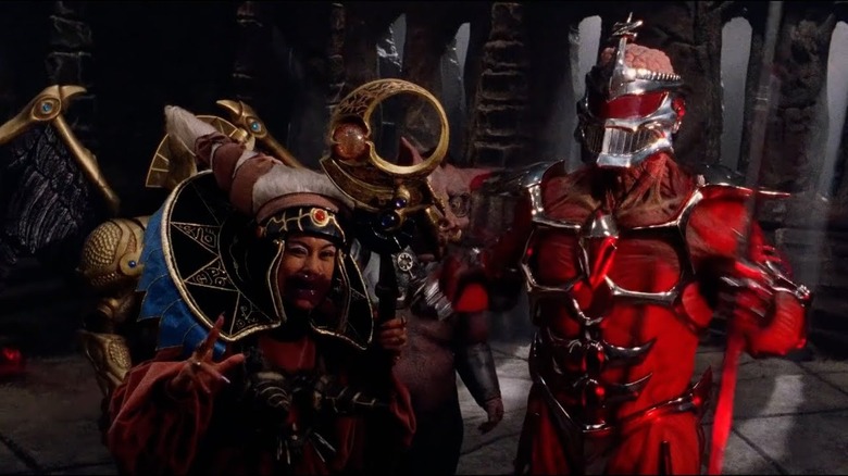 Rita Repulsa laughing as Lord Zedd raises his staff in Mighty Morphin Power Rangers: The Movi