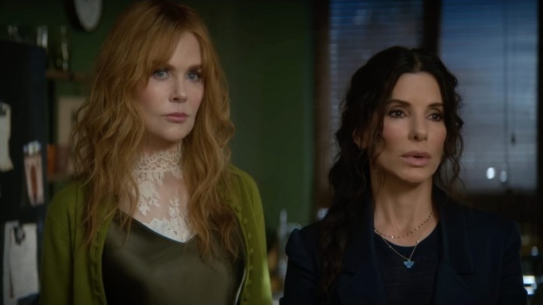 Nicole Kidman as Gilly Owens standing next to Sandra Bullock as Sally Owens in Practical Magic 2