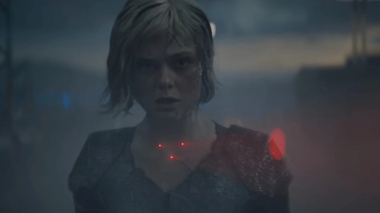 Thia is targeted by her sister with a Yautja gun in Predator: Badlands