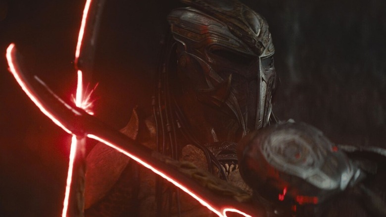 Dek has a brutal mock fight with his brother Kwei in Predator: Badlands