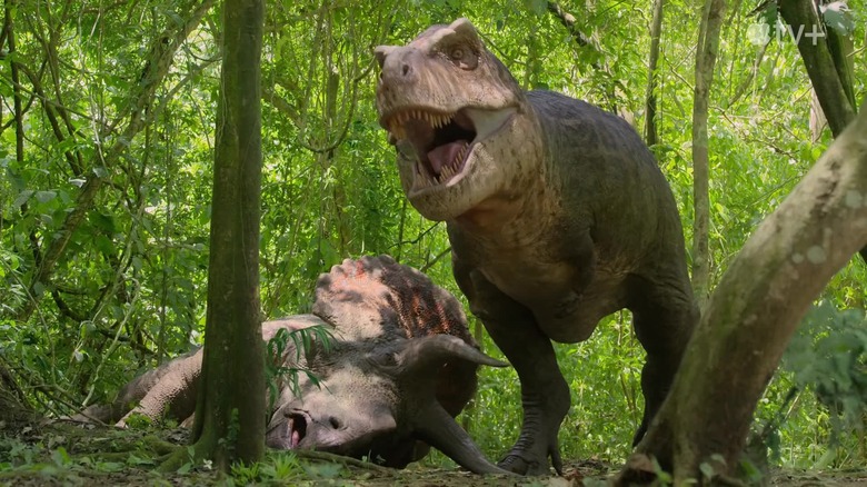 T-Rex and dead triceratops in Prehistoric Planet