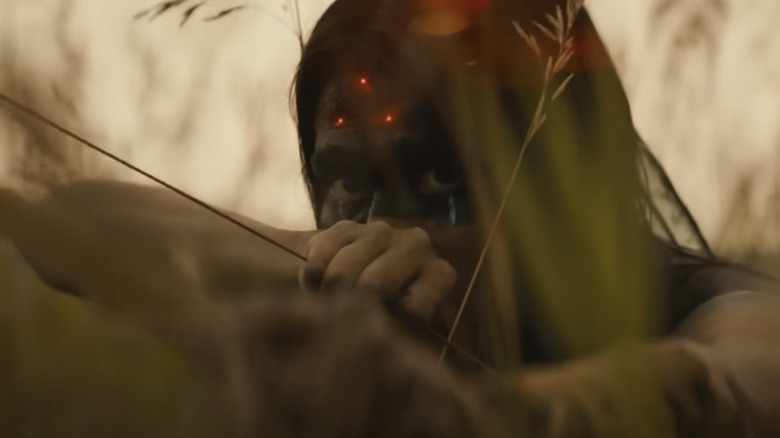 Prey character with a target on his forehead