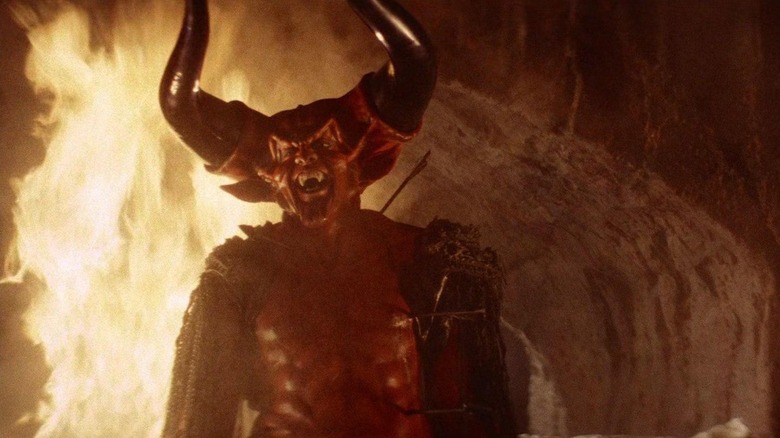 Tim Curry's Darkness laughs maniacally in Legend