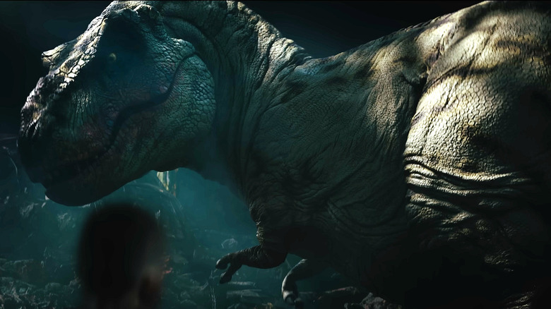 He turns T-RX to show his head in the primitive war