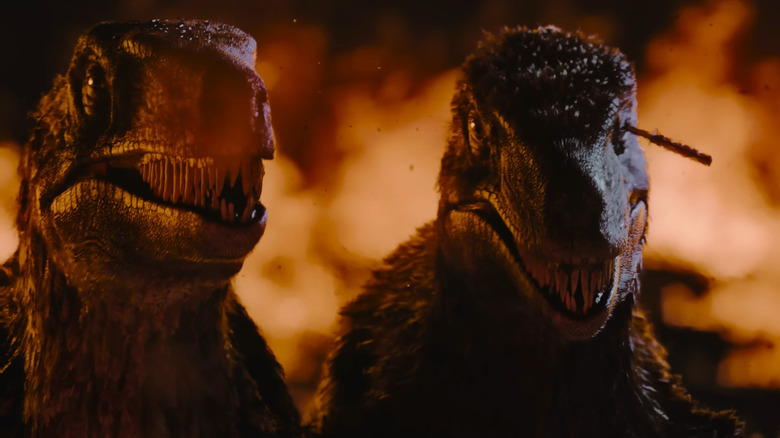 Raptors surrounded by flames in Primitive War