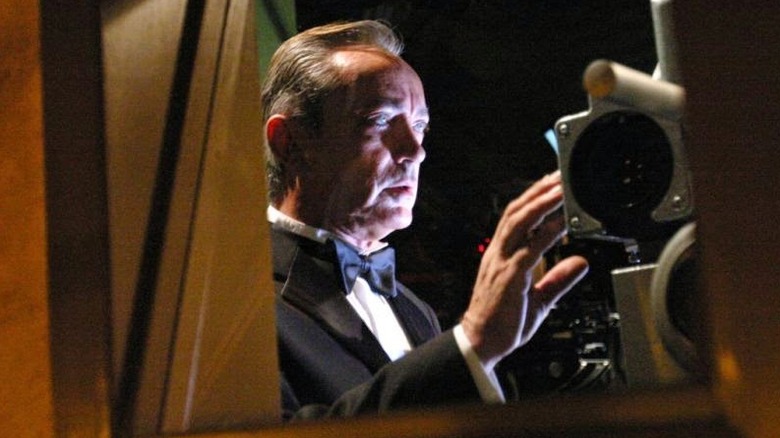 Bellinger in a projection booth in Cigarette Burns