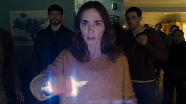 Margaret holding The Device with Santiago and Daniel behind her in Disclosure Day