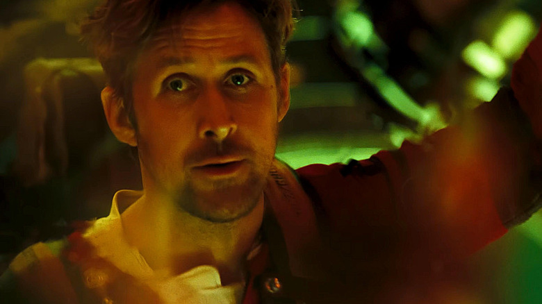 Ryan Gosling as Ryland Grace sitting in the cockpit of a spaceship in Project Hail Mary