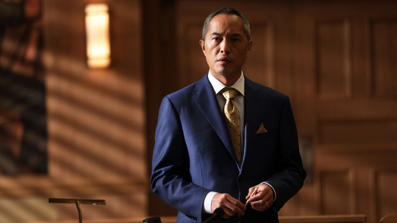 Ken Leung as AUSA Michael Sima in a blue suit in The Blacklist