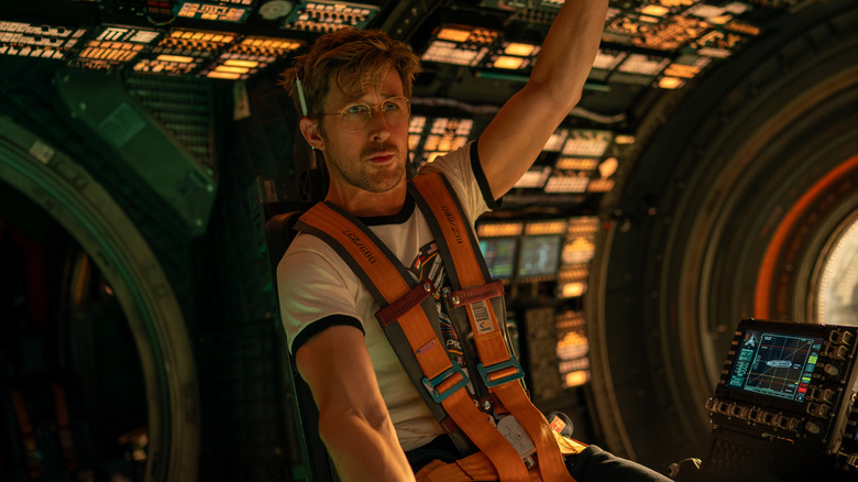 Ryan Gosling as Ryland Grace sitting in a spaceship in Project Hail Mary