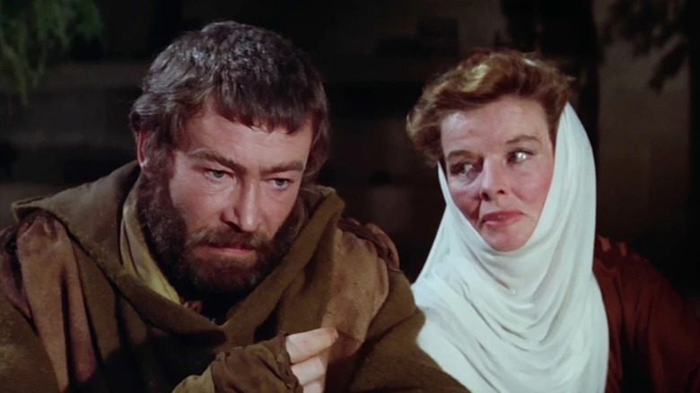 Peter O'Toole as King Henry II speaks with Katharine Hepburn as Eleanor of Aquitaine in The Lion in Winter