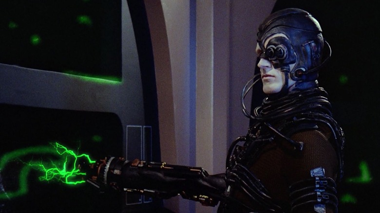 A Borg at an engineering panel on Star Trek: the Next Generation