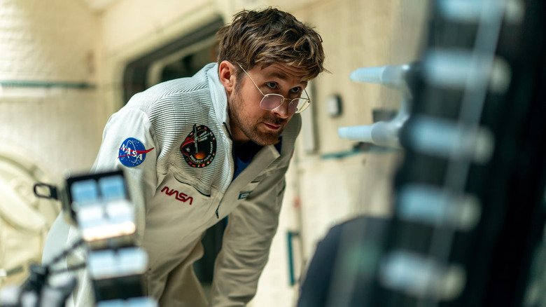 Ryland Grace (Ryan Gosling) wearing a NASA flight suit in Project Hail Mary