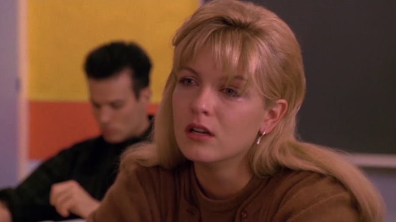 A very distressed looking Sheryl Lee as Laura Palmer sitting in class in Twin Peaks: Fire Walk With Me